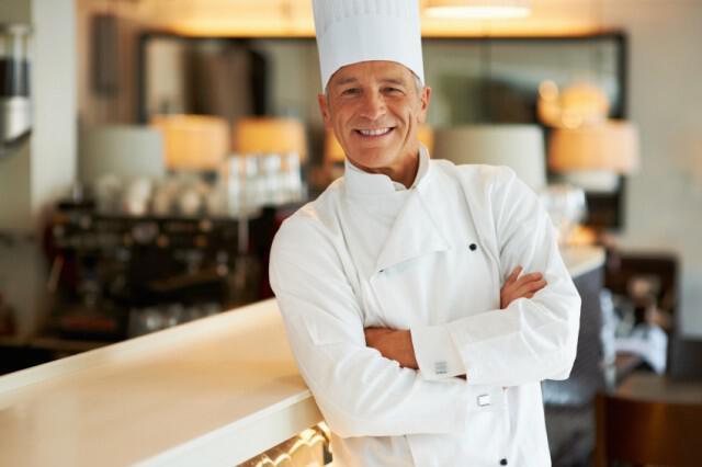 Successful smiling executive chef