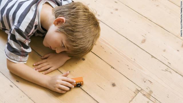 111108082205-boy-child-playing-car-floor-autism-story-top
